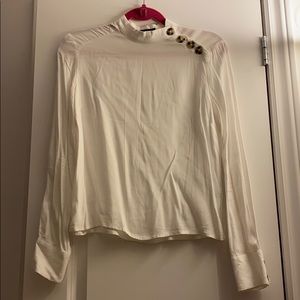 White blouse with marble looking buttons